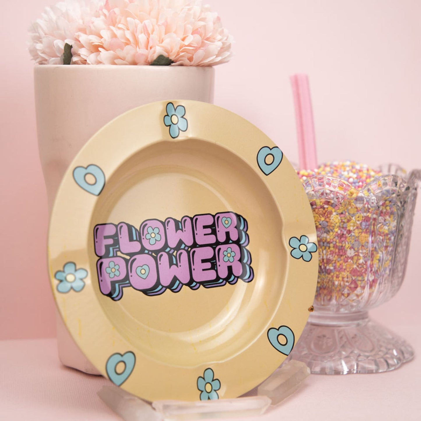Planet X | Flower Power Metal Ashtray , sprinkles in a cup with straw and flowers in a vase